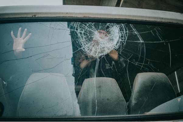 A car with a cracked windshield